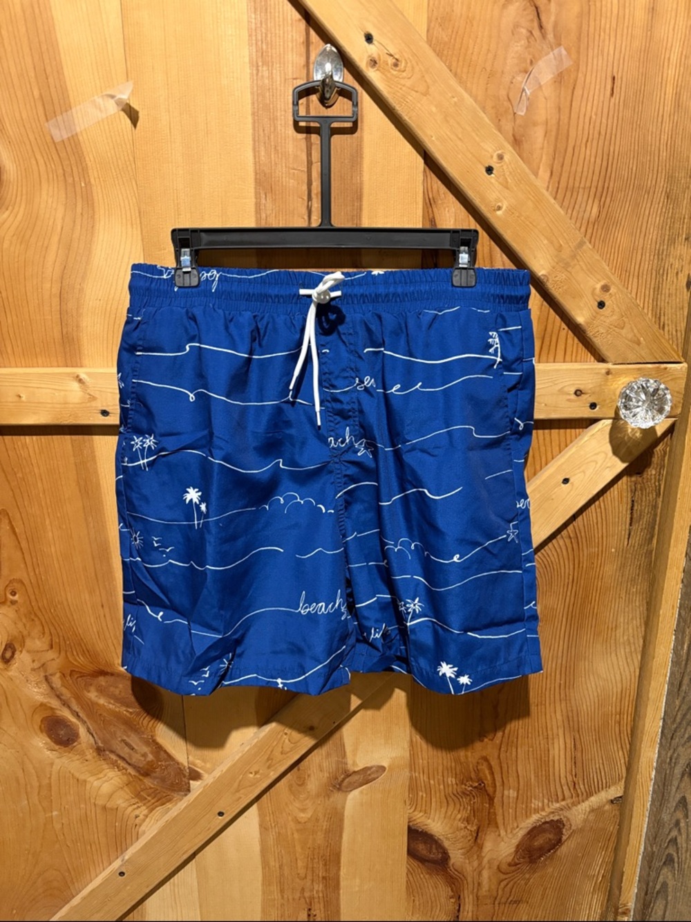Cupshe Blue Men’s Drawstring Swim Trunks with White Tropical Sketch